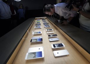 The iPhone 6 is displayed on Tuesday, Sept. 9, 2014, in Cupertino, Calif.