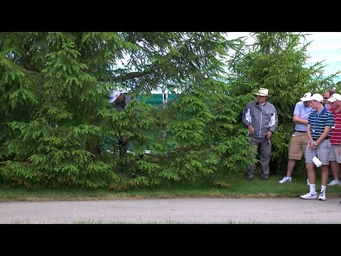 Dustin Johnson advances ball on cart path at the Memorial