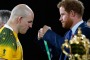 A gutted Stephen Moore gets his runners-up medal from Prince Harry.