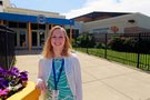 Shannon McGurk, a substitute teacher in the Downingtown Area School District, stands in front of Downingtown East High School.