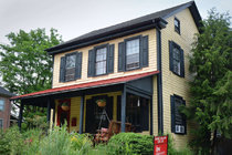 Surrounded by greenery, this home at 215 Washington Ave. is on the market for $339,000. The residence is part of the town´s burgeoning and reasonable real estate.