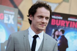 Anton Yelchin arrives at a special screening of "Burying the Ex" held at Grauman's Egyptian Theatre on Thursday, June 11, 2015, in Los Angeles.