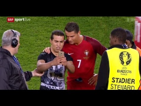 Amazing FOOTAGE: Cristiano Ronaldo Stops Sercurity taking a fan away and Takes selfie with him!!!