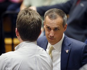 n this photo taken April 3, 2016, Donald Trump’s campaign manager Corey Lewandowski talks to a member of the media at Nathan Hale High School in West Allis, Wis.