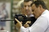 A customer examines a firearm at a gun shop in Fort Worth, Texas.