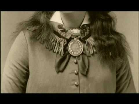 Annie Oakley shoots glass balls