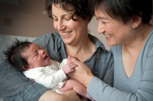 Penny Wong and partner Sophie Allouache after the birth of their daughter Alexandra in 2011. 