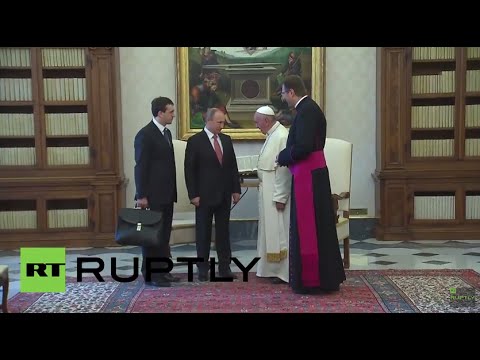 Holy See: Pope Francis greets Putin at the Vatican