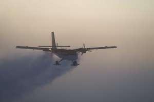 In this 2003 photo, provided by the National Science Foundation, a Twin Otter flies out of the South Pole on a previous medical flight.