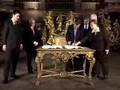 Gordon Brown signs the Treaty of Lisbon