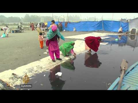 Devotion suffocates India's sacred Yamuna river