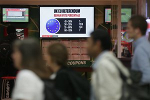 Betting odds for the the EU referendum result are displayed in a betting shop in Westminster, London, Thursday, June 23, 2016.