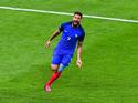 Olivier Giroud celebrates after scoring the opening goal at the Euro 2016 for France.