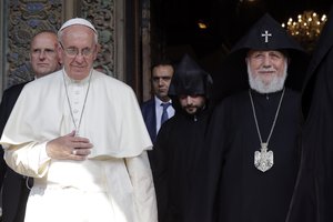 Pope Francis and Catholicos Karekin II leave the Apostolic Cathedral of Etchmiadzint, Yerevan, Armenia, Friday, June 24, 2016. Pope Francis is in Armenia for a three-day visit.