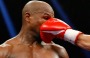 Manny Pacquiao throws a right at Floyd Mayweather during their welterweight unification championship bout in May 2015.