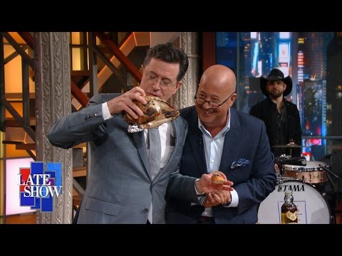 Andrew Zimmern Gets Stephen To Eat Brains