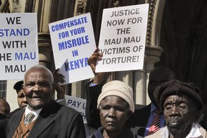 File - Some of the four Kenyans who are taking The British government to court, with left-right; Wambugu Wa Nyingi, Jane Muthoni Mara, Paulo Nzili, outside the Royal Courts of Justice, in central London, Thursday, April 7, 2011, as four elderly Kenyans who claim that they were severely beaten and tortured by British officers during an anti-colonial rebellion in the 1950s are taking their case to court in London.