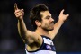 Daniel Menzel celebrates after kicking a goal. 