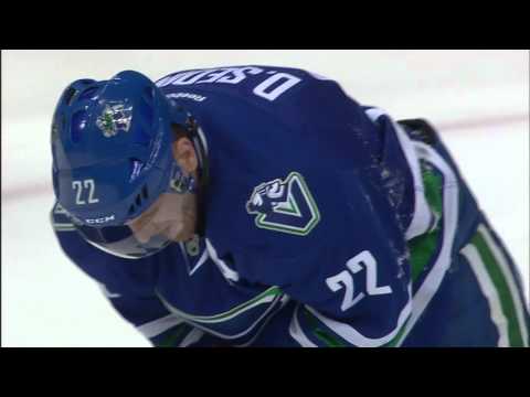 Gotta See It: Stone bats puck right into Daniel Sedin’s mouth