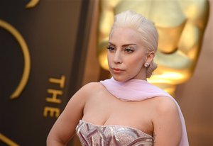 Lady Gaga arrives at the Oscars on Sunday, March 2, 2014, at the Dolby Theatre in Los Angeles.