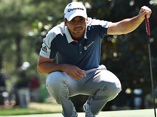 (FILES) This file photo taken on April 9, 2016 shows Australia's Jason Day as he lines up a putt on the 1st green during Round 3 of the 80th Masters Golf Tournament at the Augusta National Golf Club in Augusta, Georgia. World number one Jason Day said June 23, 2016 he remains undecided about whether or not he will compete at the Rio Olympics because of worries about the mosquito-transmitted Zika virus. Speaking at a promotional event ahead of defending his first major title at next month's PGA Championship at Baltusrol, the 28-year-old Australian said he will talk with his family and agent Bud Martin about the risks before taking a final decision. / AFP PHOTO / Nicholas Kamm