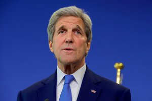 U.S. Secretary of State John Kerry, flanked by European Union High Representative for Foreign Affairs Federica Mogherini, delivers a statement to waiting reporters on June 27, 2016, at the Berlaymont Building, the headquarters of the European Commission in Brussels, Belgium