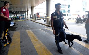 Security officials inspect patrol near the entrance of Istanbul's Ataturk airport, Wednessday, June 29, 2016.