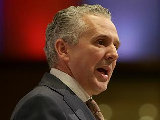 Photos of Telstra CEO Andrew Penn speaking at the American Chambers of Commerce Lunch in Melbourne