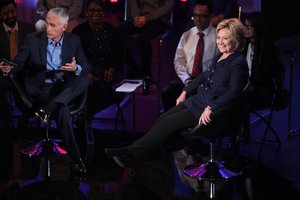 Jorge Ramos and former Secretary of State Hillary Clinton speaking at the Brown & Black Presidential Forum at Sheslow Auditorium at Drake University in Des Moines, Iowa, presidential campaign, 2016, United States