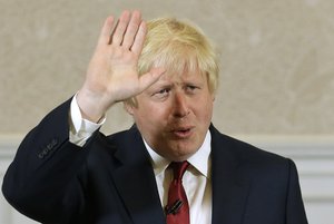 Former London mayor Boris Johnson waves after he announced that he will not run for leadership of Britain's ruling Conservative Party in London, Thursday, June 30, 2016.