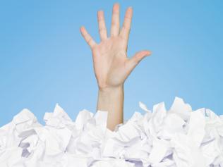 23/01/2012 BUSINESS: Human buried in papers, drowning in debt. Pic. Thinkstock Supplied