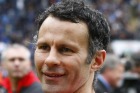 Ryan Giggs, pictured in 2011,  celebrating after Manchester United won the English Premier League.