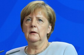 Angela Merkel, Germany's chancellor, speaks during a news conference at the Chancellery in Berlin, Germany, on Monday, ...