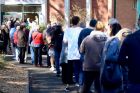 Voters line up outside a polling station in Sydney on Saturday.