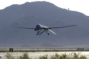 File - An MQ-1 Predator unmanned aerial vehicle takes off from Creech Air Force Base, Nev., May 11, for a training sortie over the Nevada desert.