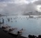 Guests relax in geothermal seawater in the main lagoon at the Blue Lagoon spa in Grindavik, Iceland.