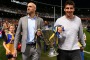 PERTH, AUSTRALIA - JUNE 30: Chris Judd and Andrew Embley walk a lap of honour with team mates celebrating the West Coast ...