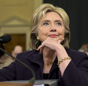 Democratic presidential candidate and former Secretary of State Hillary Rodham Clinton, listens as she testifies on Capitol Hill in Washington, Thursday, Oct. 22, 2015, before the House Select Committee on Benghazi