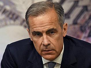 Governor of the Bank of England Mark Carney, speaks during the Bank of England Financial Stability Report press conference, at the central bank in central London on July 5, 2016. The Bank of England on Tuesday relaxed commercial banks' capital requirements to boost lending to businesses and households, and warned that financial stability risks "have begun to crystallise" after Brexit. BoE governor Mark Carney pledged it would do whatever is needed to aid monetary and fiscal stability in the wake of the June 23 referendum that saw Britain vote to exit the EU. / AFP PHOTO / POOL / DYLAN MARTINEZ