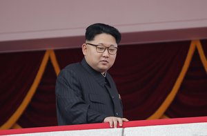 North Korean leader Kim Jong Un watches parade participants from a balcony at the Kim Il Sung Square on Tuesday, May 10, 2016, in Pyongyang, North Korea.