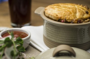 Lamb shank and farro pie served at the Acre.