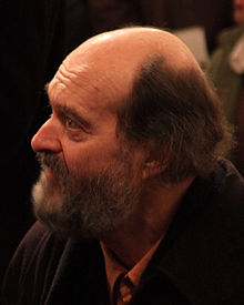 Arvo Pärt bearded balding man facing left