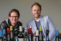 Vinomofo co-founders Andre Eikmeier (L) and Justin Dry pose for a photo at the online wine retailer's headquarters in ...