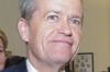 Leader Bill Shorten and deputy Tanya Plibersek are applauded as they arrive for the caucus meeting on Friday.