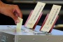 A man casts his vote for parliament's upper house election at a polling station in Himeji, Japan on Sunday.