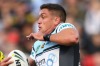 Chris Heighington, of the Sharks, makes a break during Cronulla's defeat of the Panthers at Pepper Stadium on Sunday.