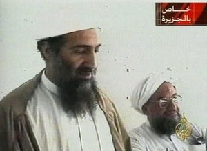 This image taken from video released by Qatar's Al-Jazeera televison broadcast on Friday Oct. 5, 2001 is said to show Osama bin Laden, the prime suspect in the Sept. 11, 2001 terrorist attacks on the United States, at an undisclosed location.