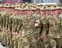 Australian Defence Forces personnel from Force Protection Element 4 (FPE4) and Force Communication Element 3 (FCE3) parade as they are farewelled before deploying to Afghanistan at Gallipoli Barracks in Brisbane, Monday, June 29, 2015. Their deployment is aimed at supporting Australia's force protection mission in Afghanistan. (AAP Image/Dan Peled) NO ARCHIVING