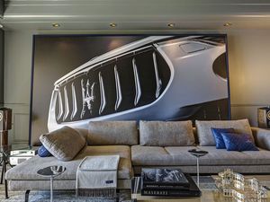 Fancy sleeping in a Maserati? Behold the ultimate hotel room