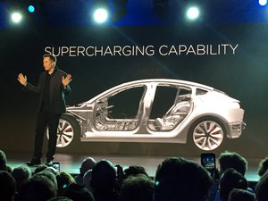 In this March 31, 2016 file photo, Tesla Motors Inc. CEO Elon Musk speaks at the unveiling of the Model 3 at the Tesla Motors design studio in Hawthorne, California.